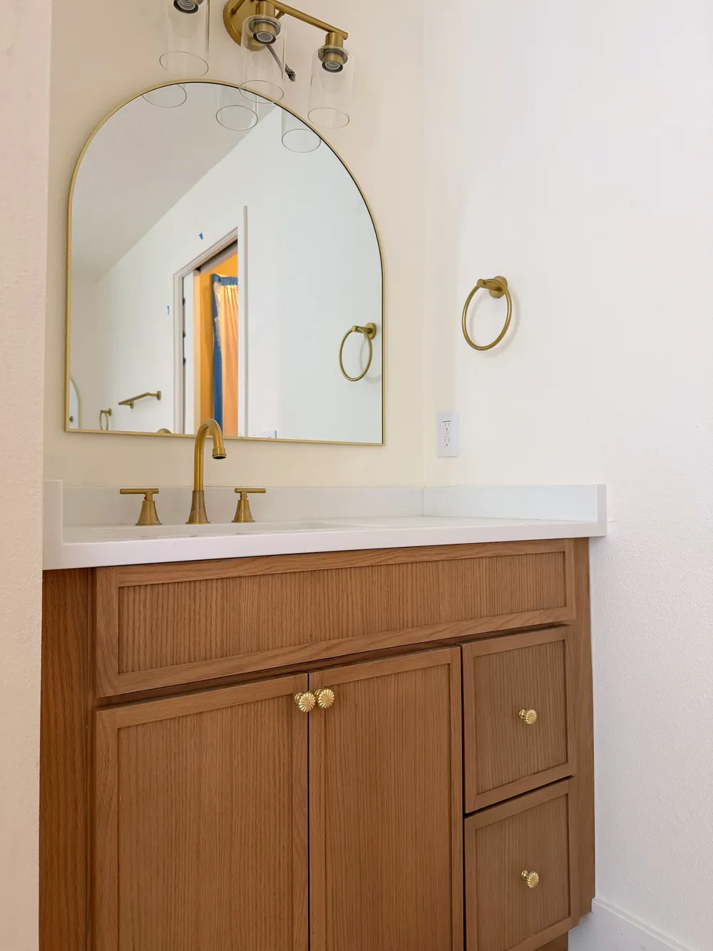 Vanity installation before final styling in the Calle bathroom.