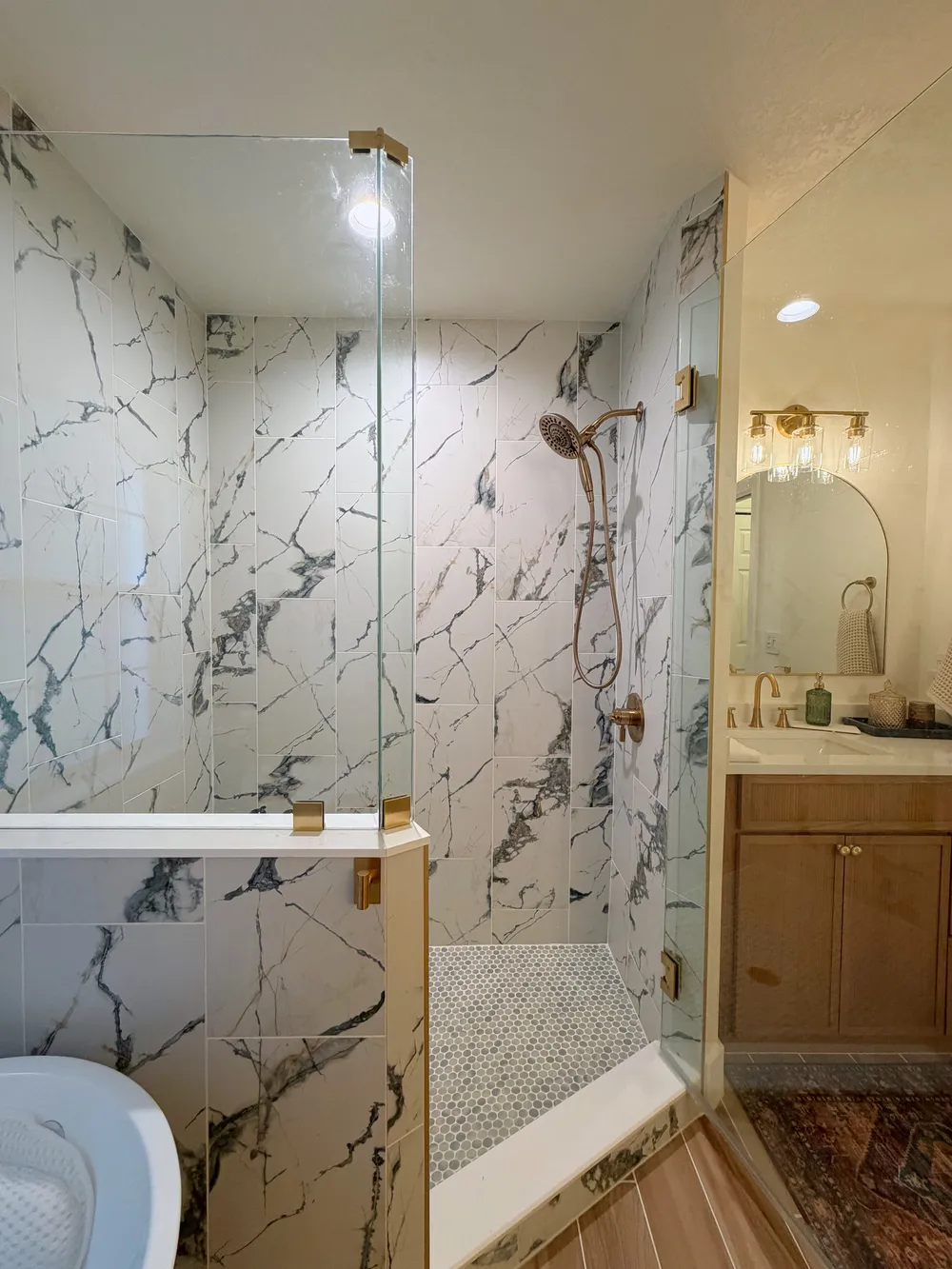 Glass shower enclosure in the Calle bathroom.