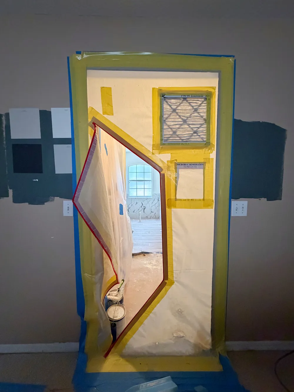 Temporary dust barrier in the Calle bathroom.