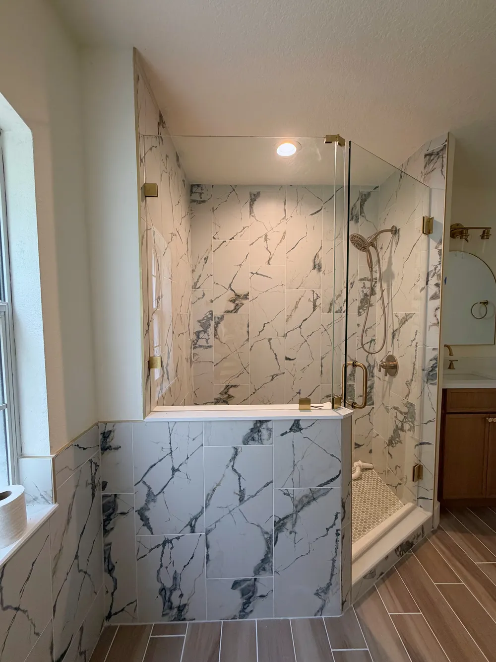 Glass shower and tile detail in the Calle bathroom.