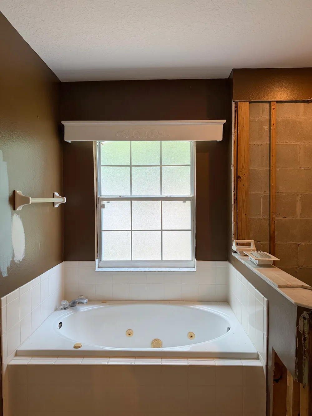Original tub during demolition in the Calle bathroom.
