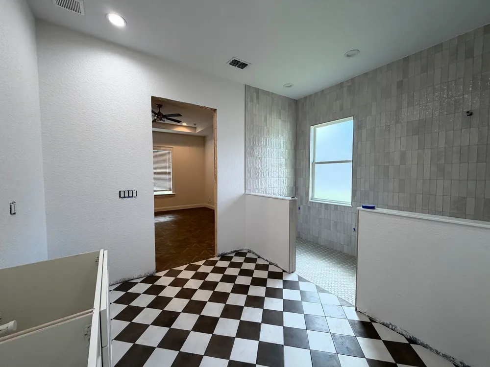 Bathroom room layout before fixtures in the Pompano bathroom.