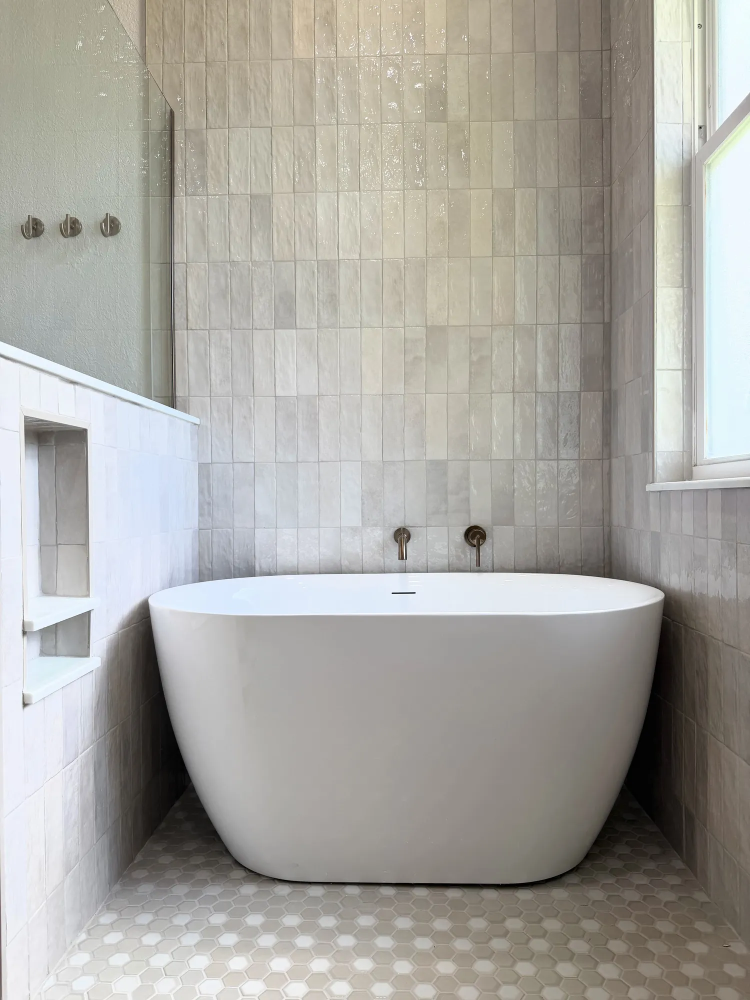 Freestanding tub in the Pompano bathroom.