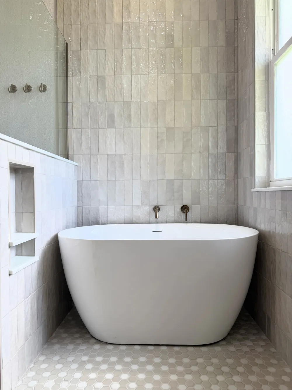 Freestanding tub in the Pompano bathroom.