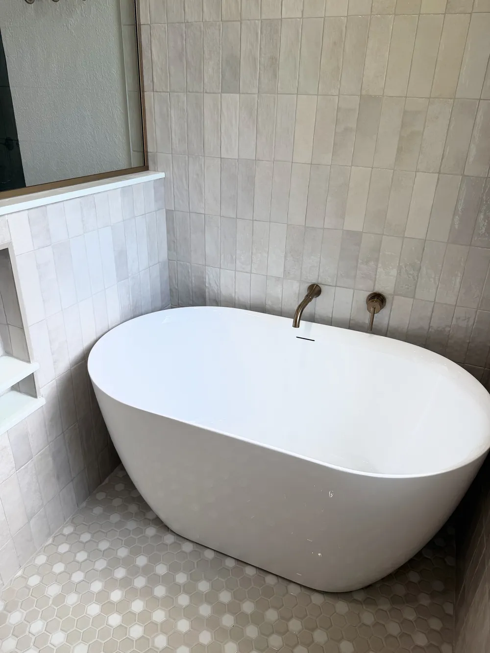 Freestanding tub close angle in the Pompano bathroom.