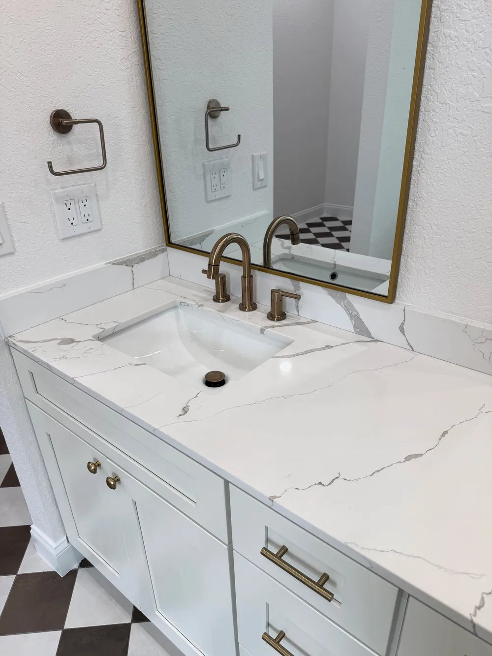 Sink and counter detail in the Pompano bathroom.
