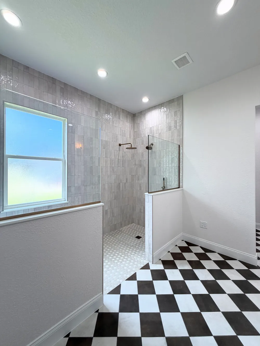 Finished shower and window in the Pompano bathroom.