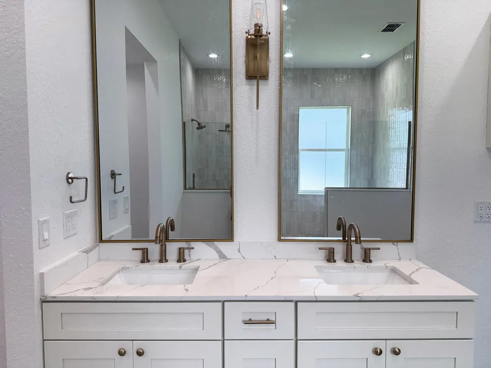 Double vanity and mirrors in the Pompano bathroom.