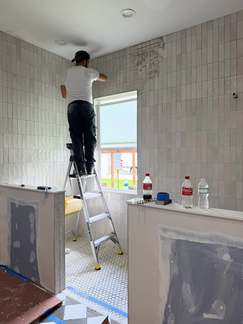 Active shower tiling in the Pompano bathroom.