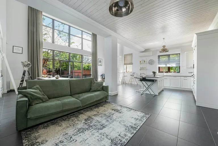 Bright Living Room with Kitchen View