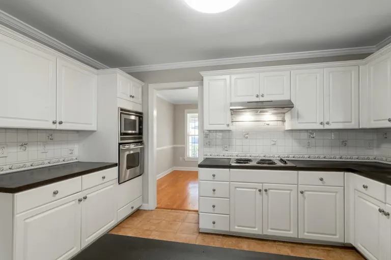 Crown Molding Kitchen White Cabinets Black Brown Countertops