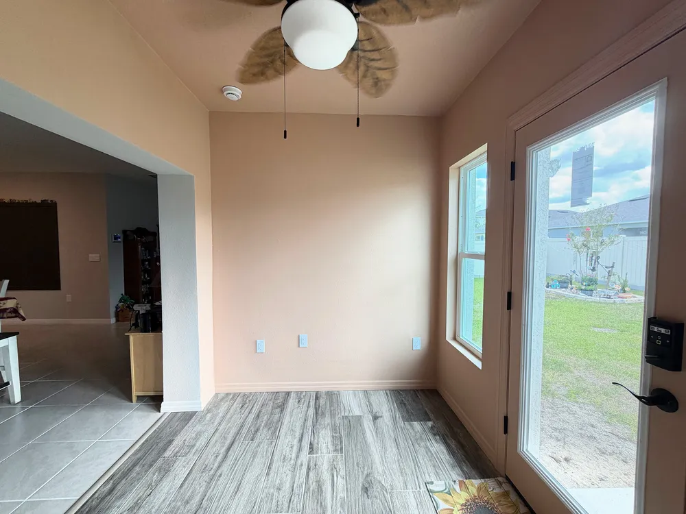 Enclosed room and connection to the home in the Edgemont patio enclosure.