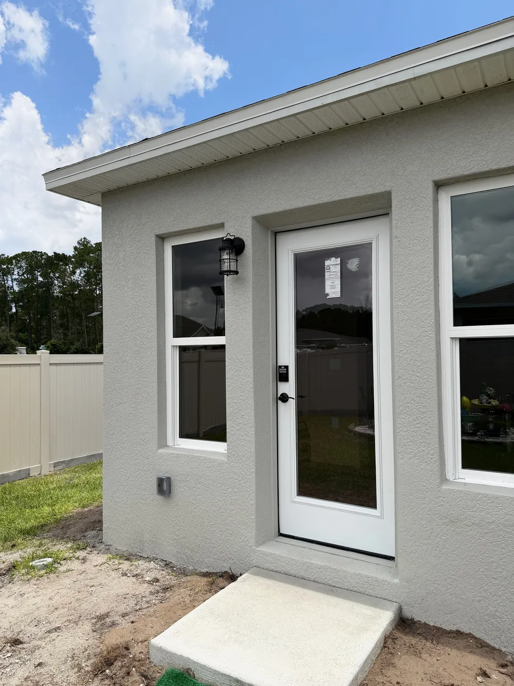 Exterior entry angle in the Edgemont patio enclosure.