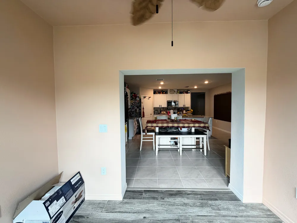 Opening into the existing interior in the Edgemont patio enclosure.