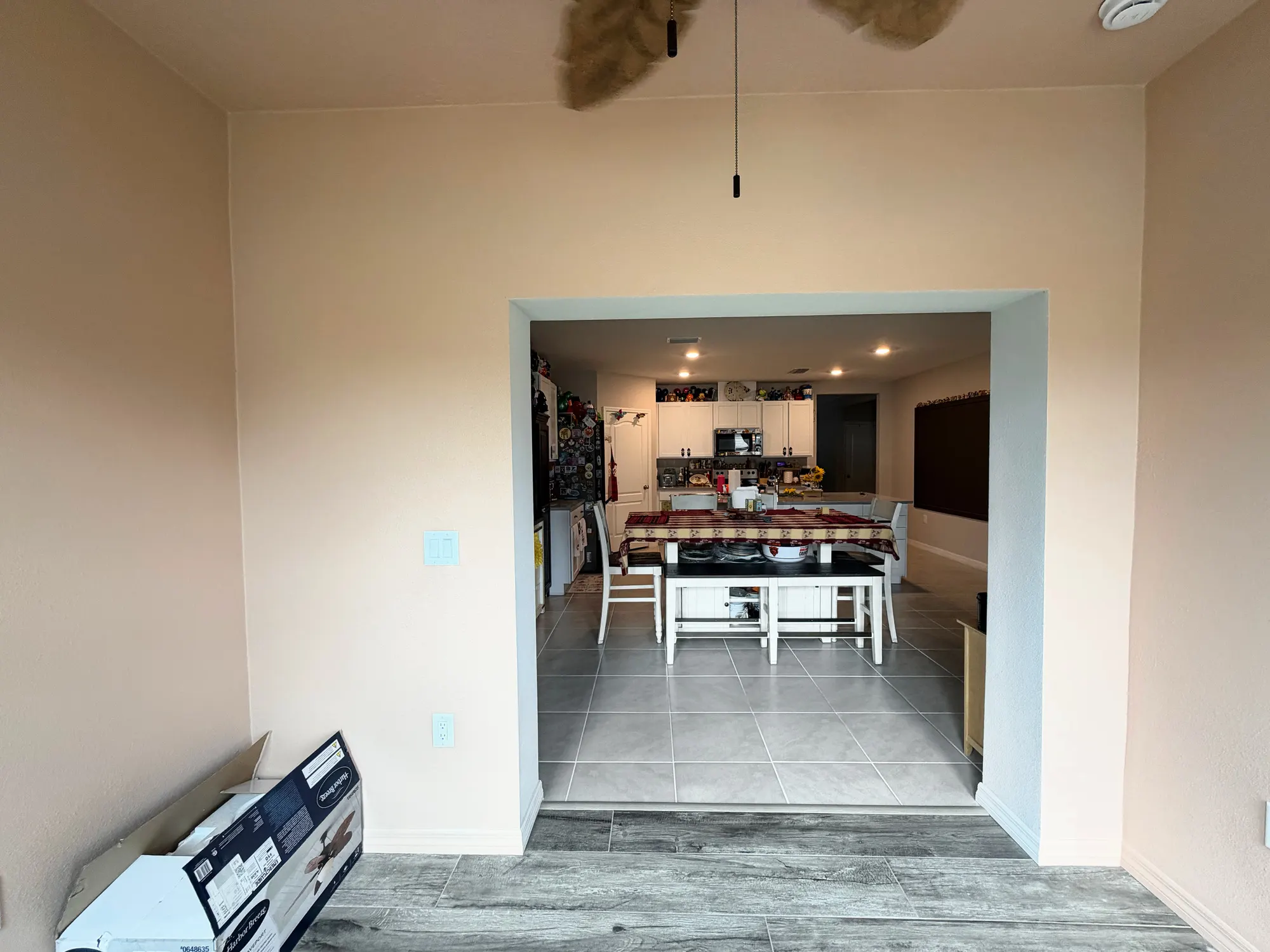 Opening into the existing interior in the Edgemont patio enclosure.