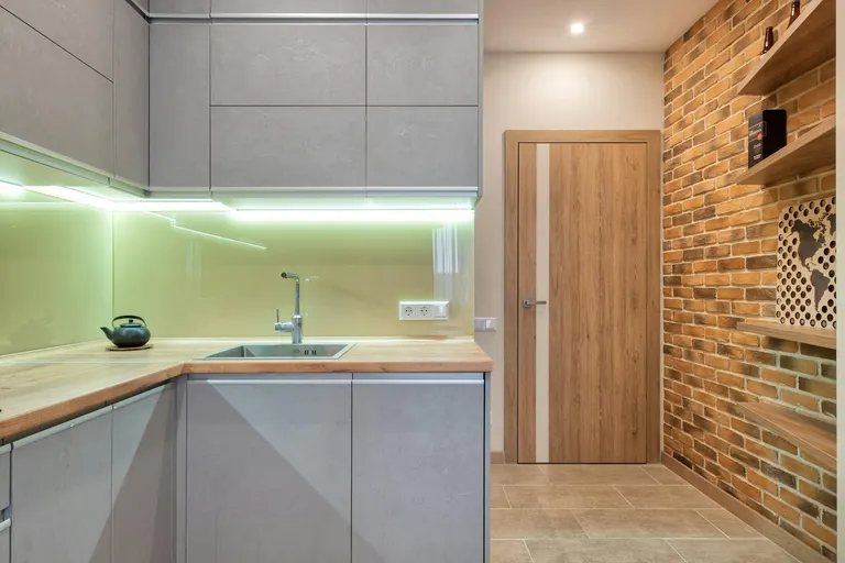 Gray Modern Cabinets with Wood Countertop
