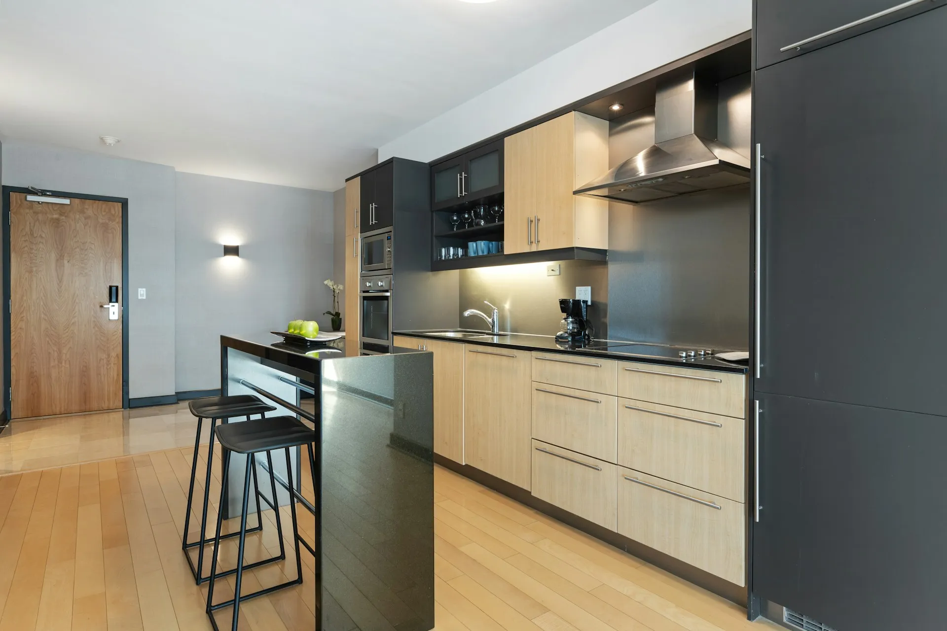 Two Tone Cabinets with Black Countertops Open Kitchen Apartment